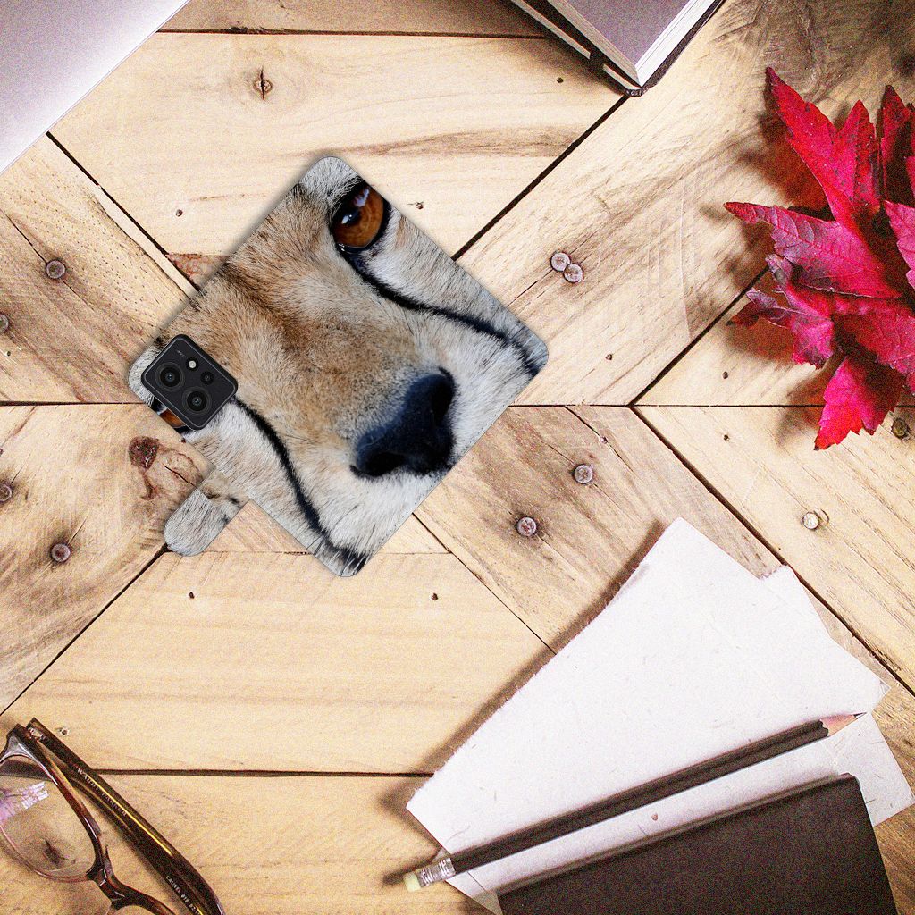 Xiaomi Redmi Note 12 4G Telefoonhoesje met Pasjes Cheetah close-up van cheeta ogen op houten achtergrond