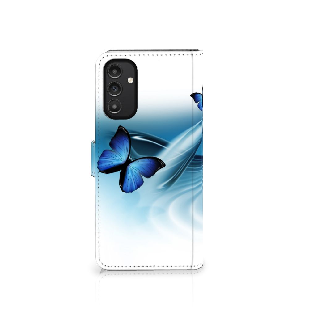 Samsung Galaxy A14 4G Telefoonhoesje met Pasjes Vlinders met blauwe vlinders en golven op de voorkant.