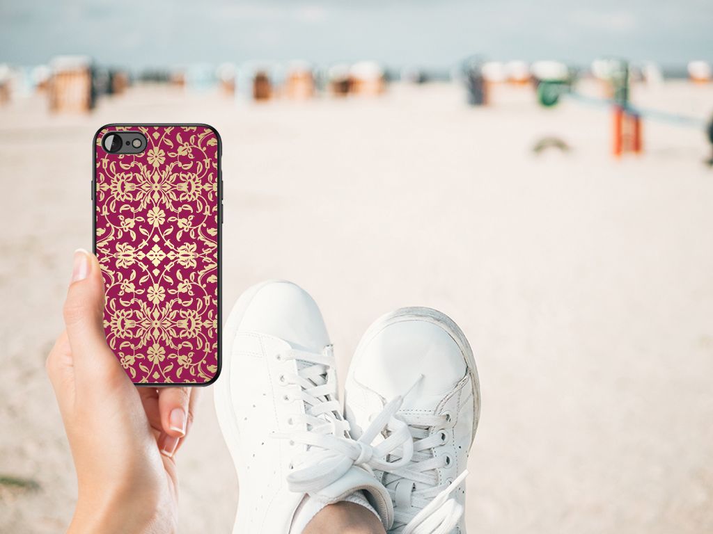 Back Cover iPhone SE 2022 | SE 2020 | 7/8 Barok Pink design showcased on the beach while someone relaxes in sneakers.