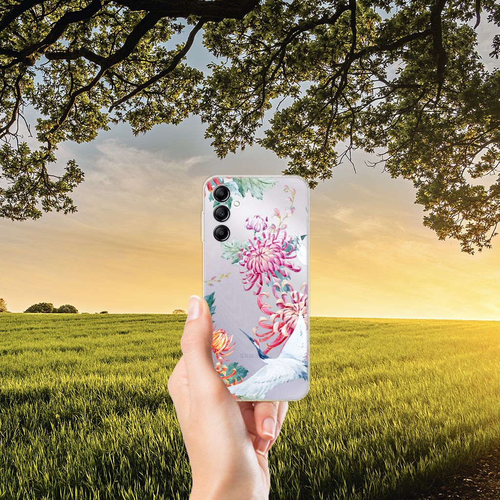 Samsung Galaxy A14 5G TPU Hoesje Bird Flowers in hand against outdoor landscape with trees and sunset.